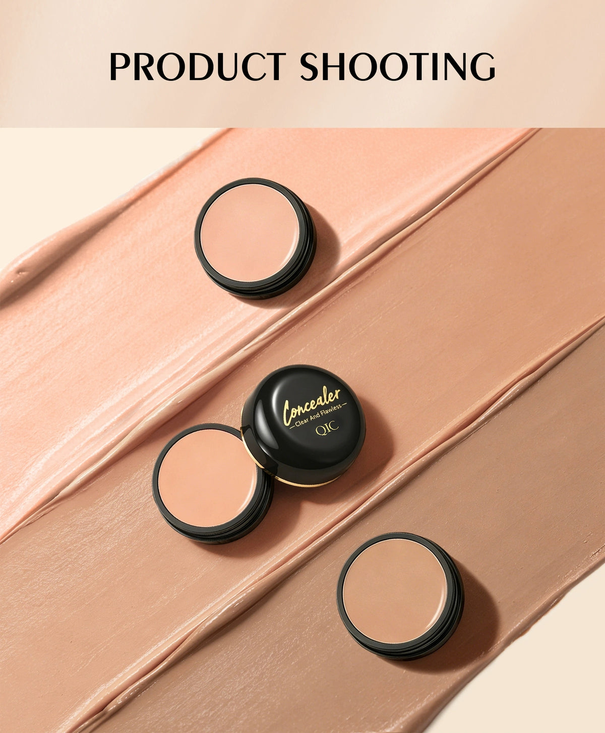 QIC concealer cream texture swatch, three color shades on background