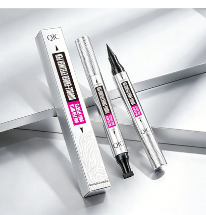 QIC double-ended black eyeliner pen with silver patterned packaging, pointed liner tip and triangular wing stamp