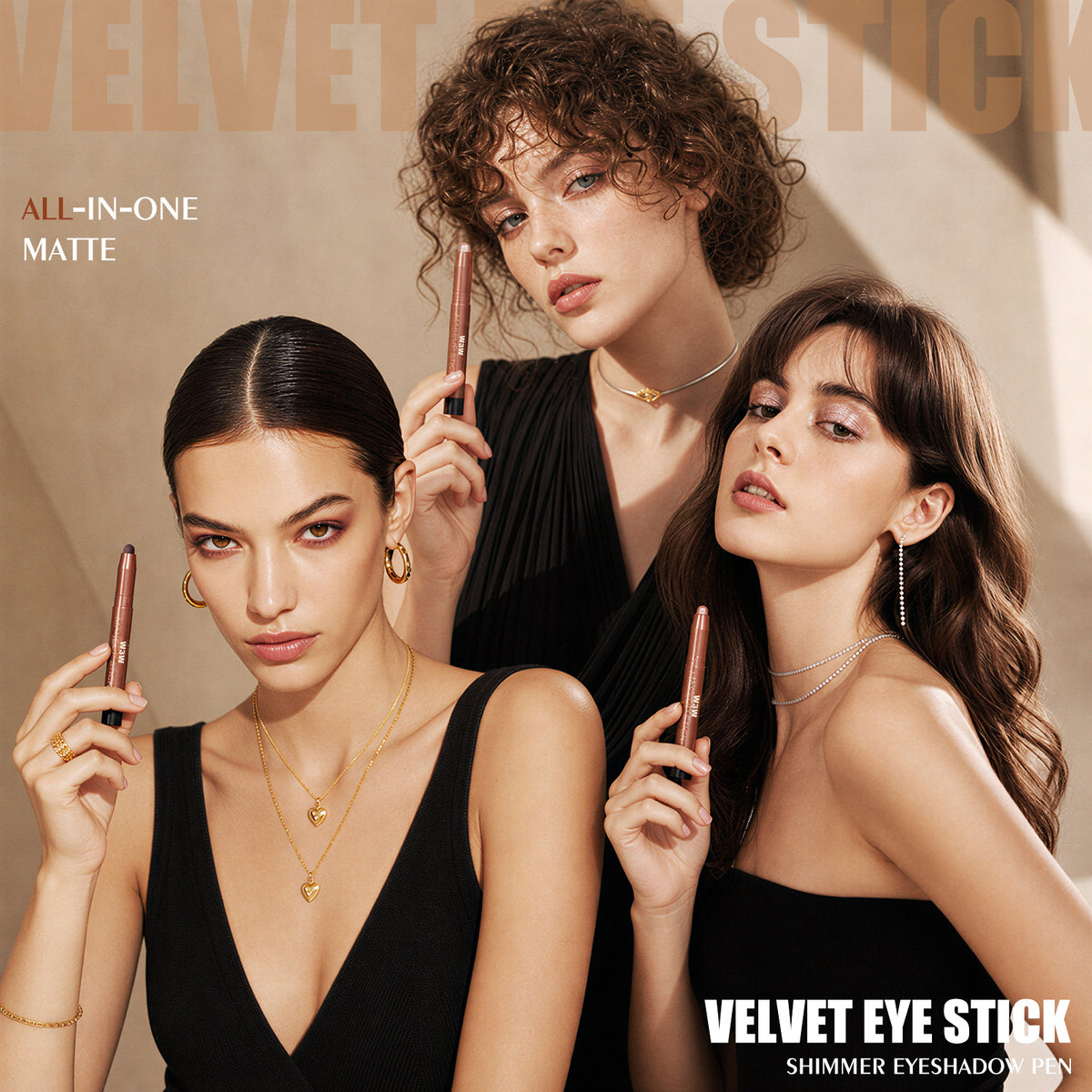 Models holding W3W Velvet Eye Stick cream eyeshadow pencils